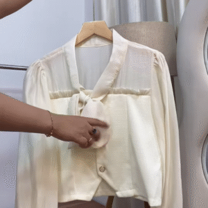 Chic Elegance in Every Thread – Cream Bow-Tie Blouse